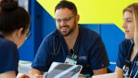 Three nursing students studying together.